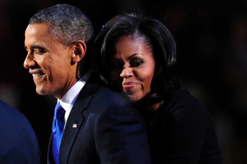 Barack-Obama-is-embraced-by-First-Lady-Michelle-Obama-onstage-after-winning-the-2012-US-presidential-election-in-Chicago-on-November-7-2012.-Robyn-BeckAFPGetty-Images-960x638